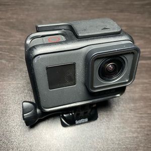 Used(like New) GoPro Hero 7 Black. Includes 3 total batteries, 32GB card, etc!
